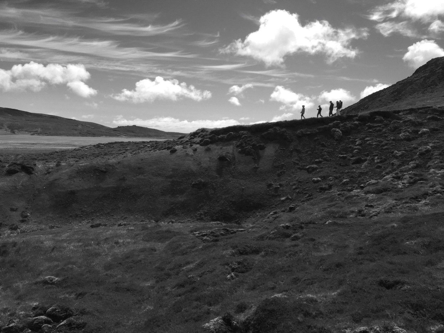 A silhouette of a group of tourists in Iceland