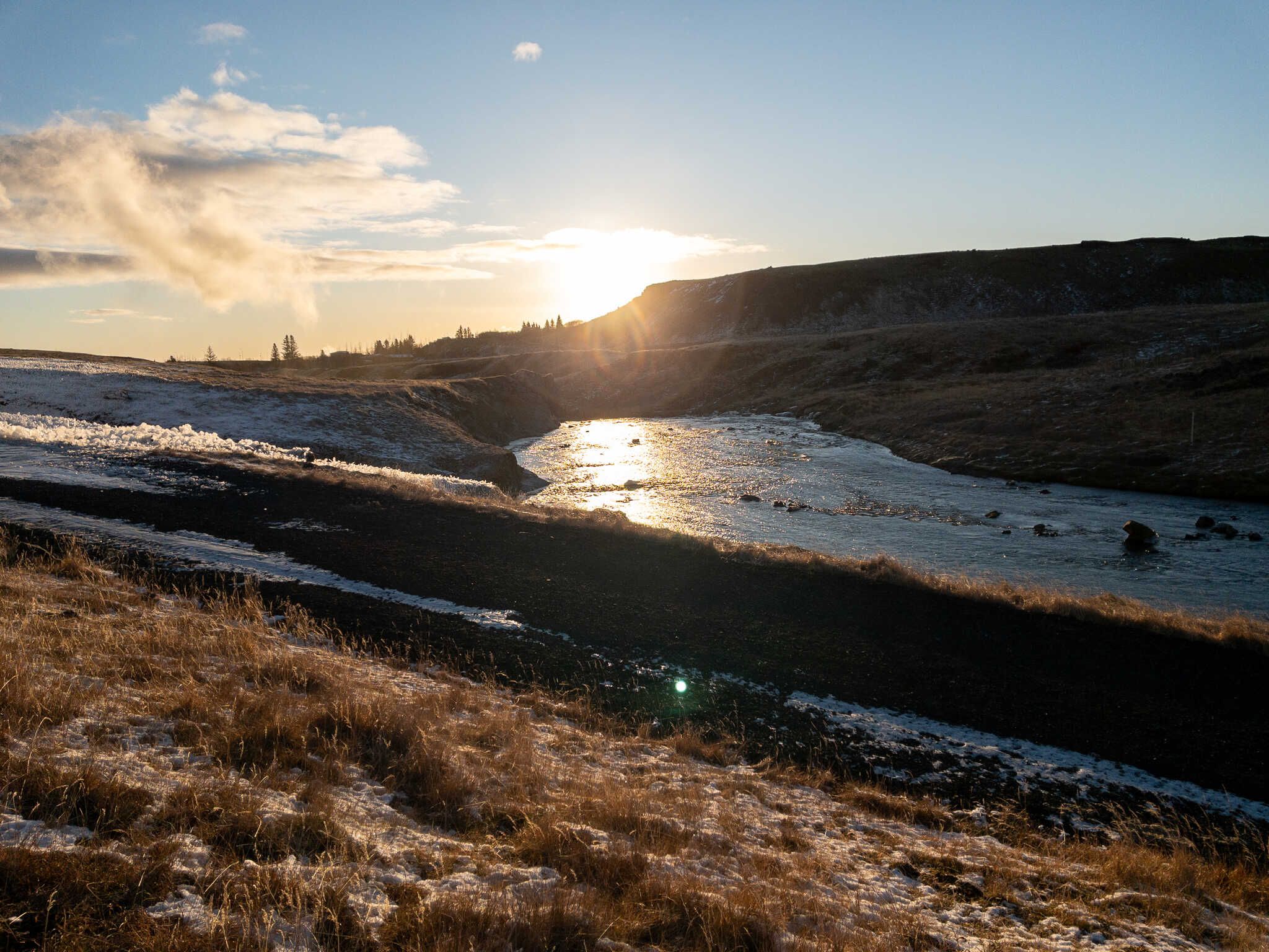 The same treeline in the distance, but now in the foreground we have Varmá river and a path on our side of the river.